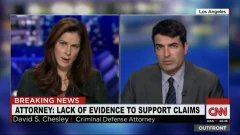 David Chesley appearing alongside a CNN news anchor